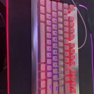 Pink gaming keyboard and mouse